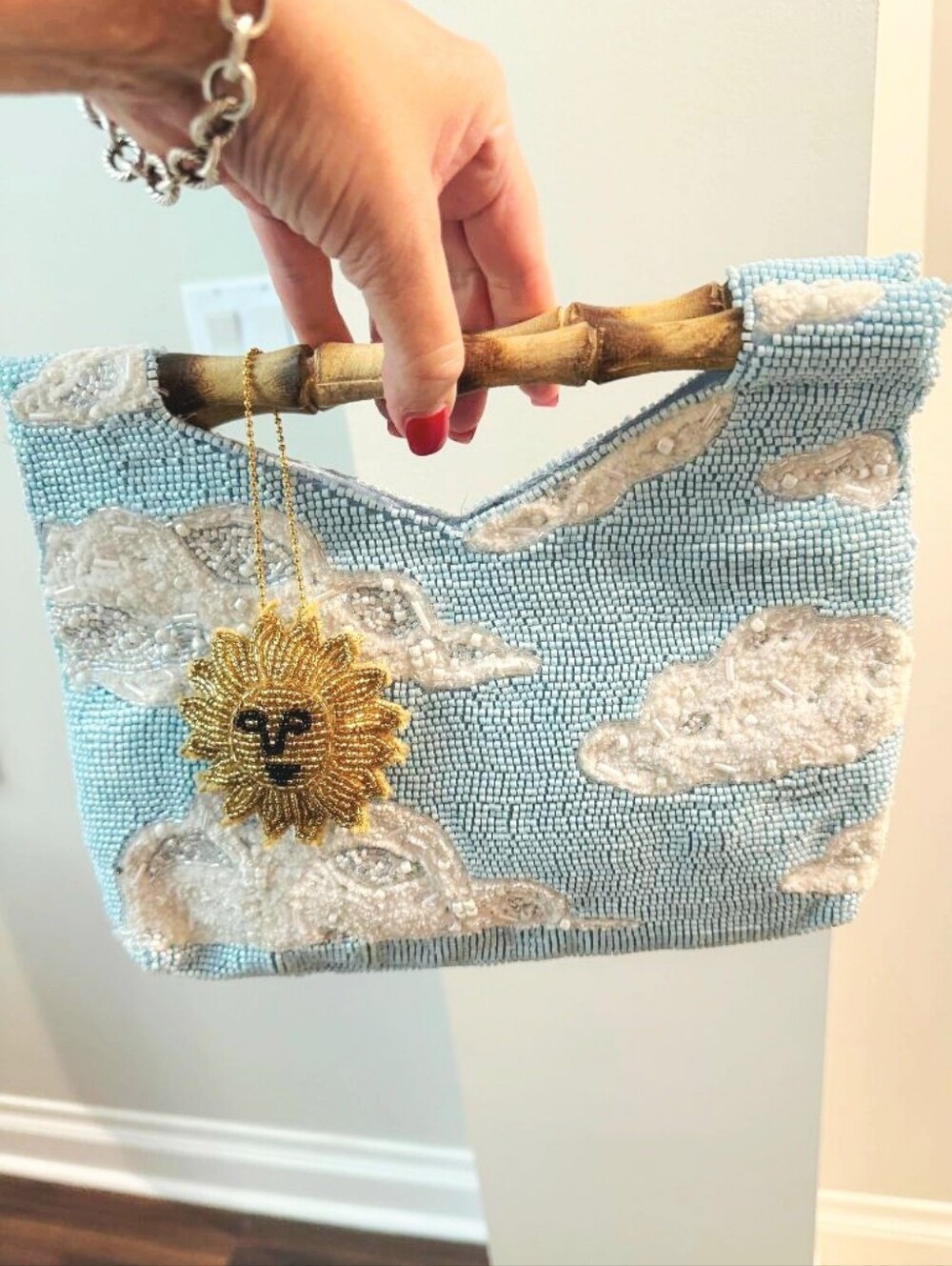 Beaded Light Blue Cloud Clutch with Bamboo Handle and Gold Sun Charm